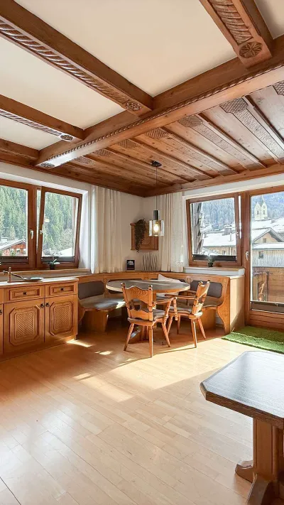 Sandro Anibas sitzt in einer luxuriösen Wohnung und schaut lächelnt von einer Zeitschrift auf