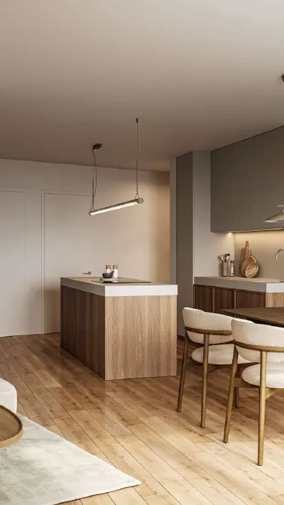 Sandro Anibas sitzt in einer luxuriösen Wohnung und schaut lächelnt von einer Zeitschrift auf