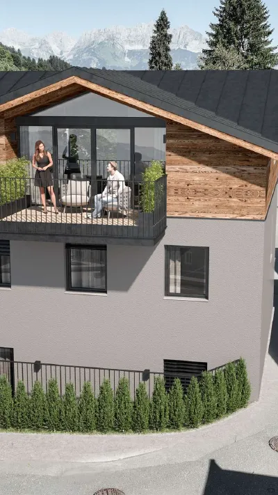Sandro Anibas sitzt in einer luxuriösen Wohnung und schaut lächelnt von einer Zeitschrift auf